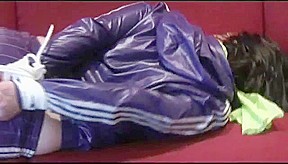 Get 3 Archive Videos With A Women Enjoying Bondage Her Shiny Nylon Shorts From 2012!
