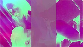 Slender ladyboy in pink panties strokes her shaved cock in bed